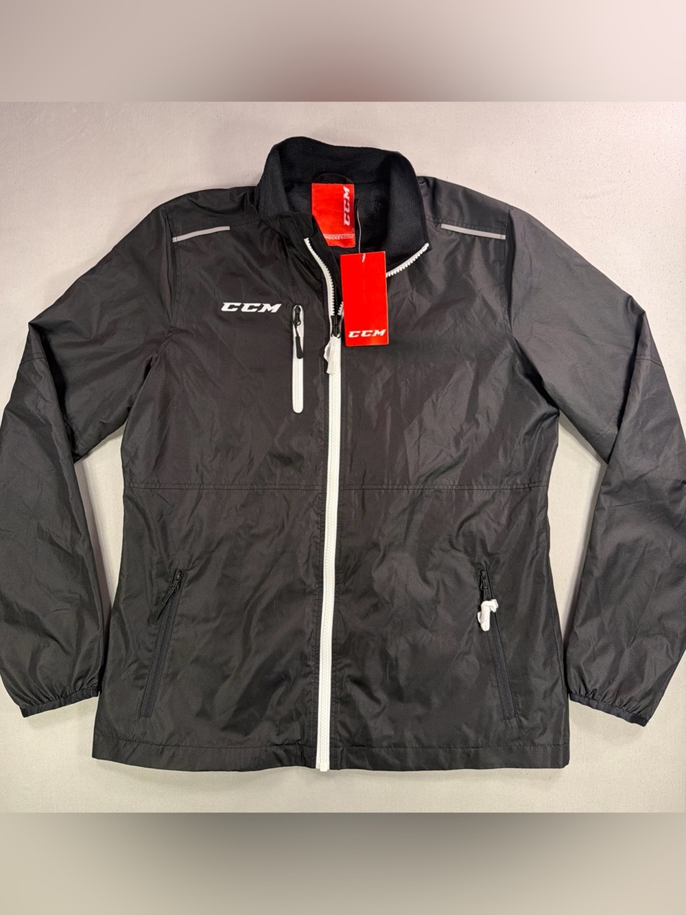 CCM Black Windbreaker Jacket with White Zipper Accents